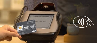 Contactless symbol shows a hand holding a chip over the indicator inside an oval outline.