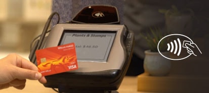 Contactless symbol shows a hand holding a chip over the indicator inside an oval outline.